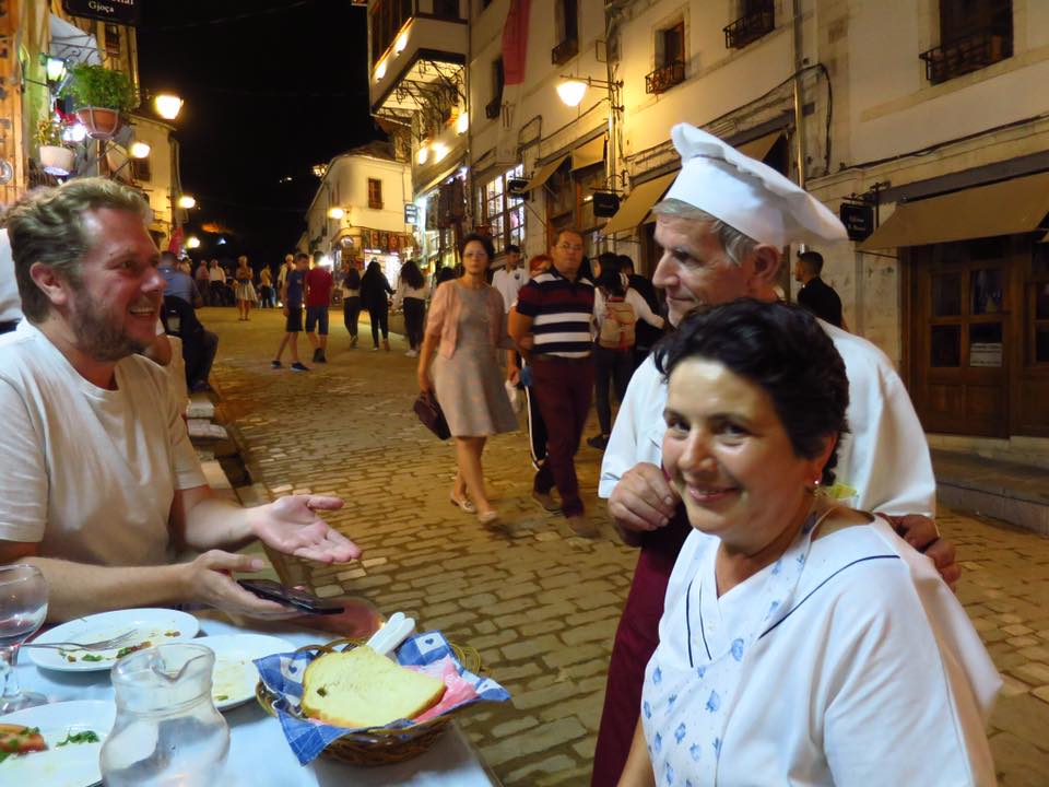 Kenric, Defrim, and Buko in front of Restaurant Gjoca